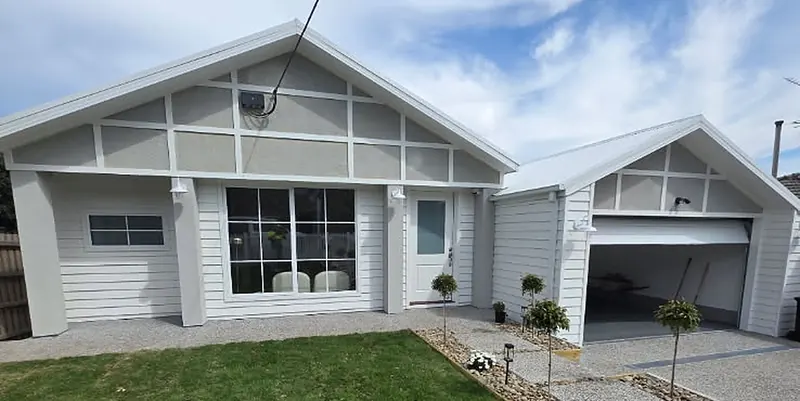 Recent job: a weatherboard home with a roughcast finish on the gable panels